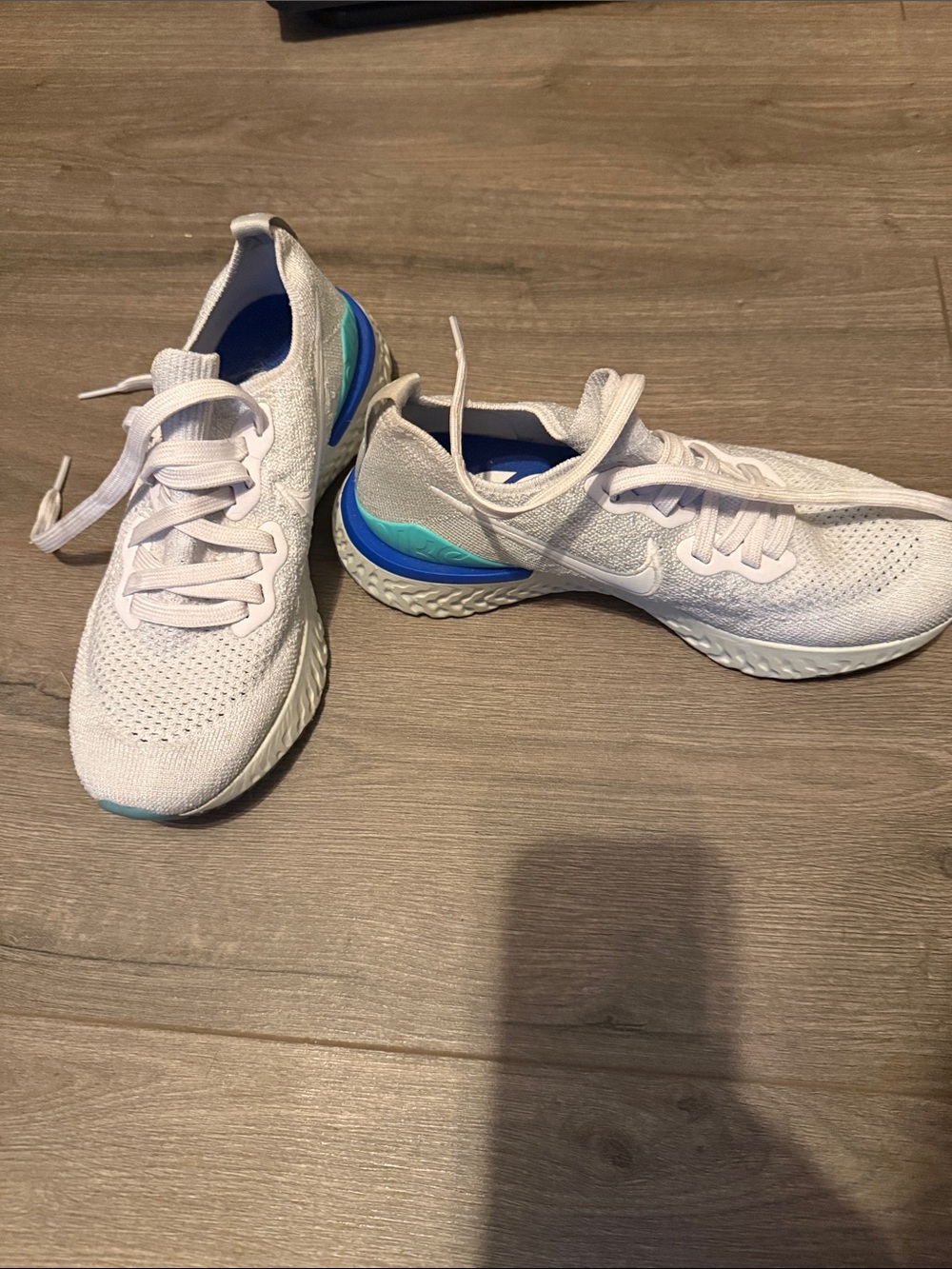 Nike Women’s White Sneakers with Blue and Teal Accents